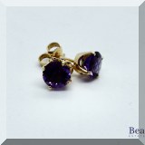 J015. 14K yellow gold and amethyst or purple stone stud earrings. - $125 